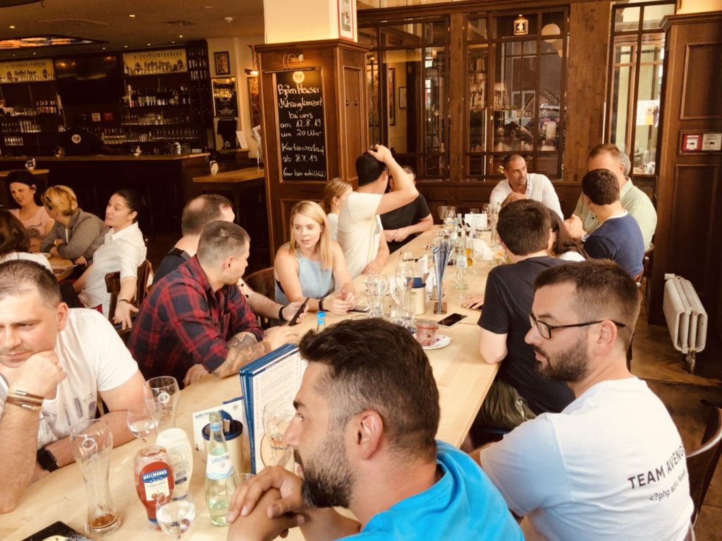 Group of People in Restaurant Group of People in Restaurant